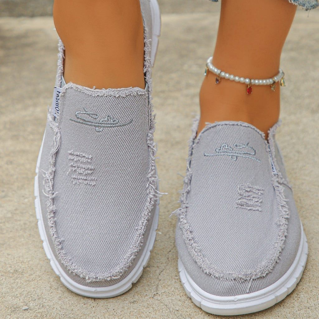 Mocasines de lona desgastada con bordado, sin cordones