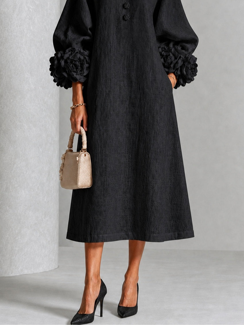 Vestido midi abotonado de flores en negro con puños de flores