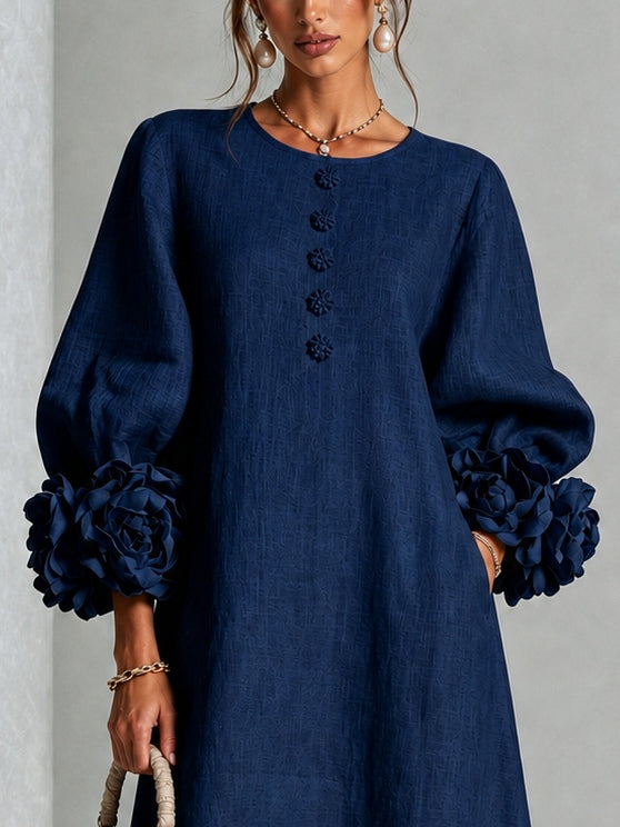 Vestido midi abotonado de flores en azul marino con puños de flores