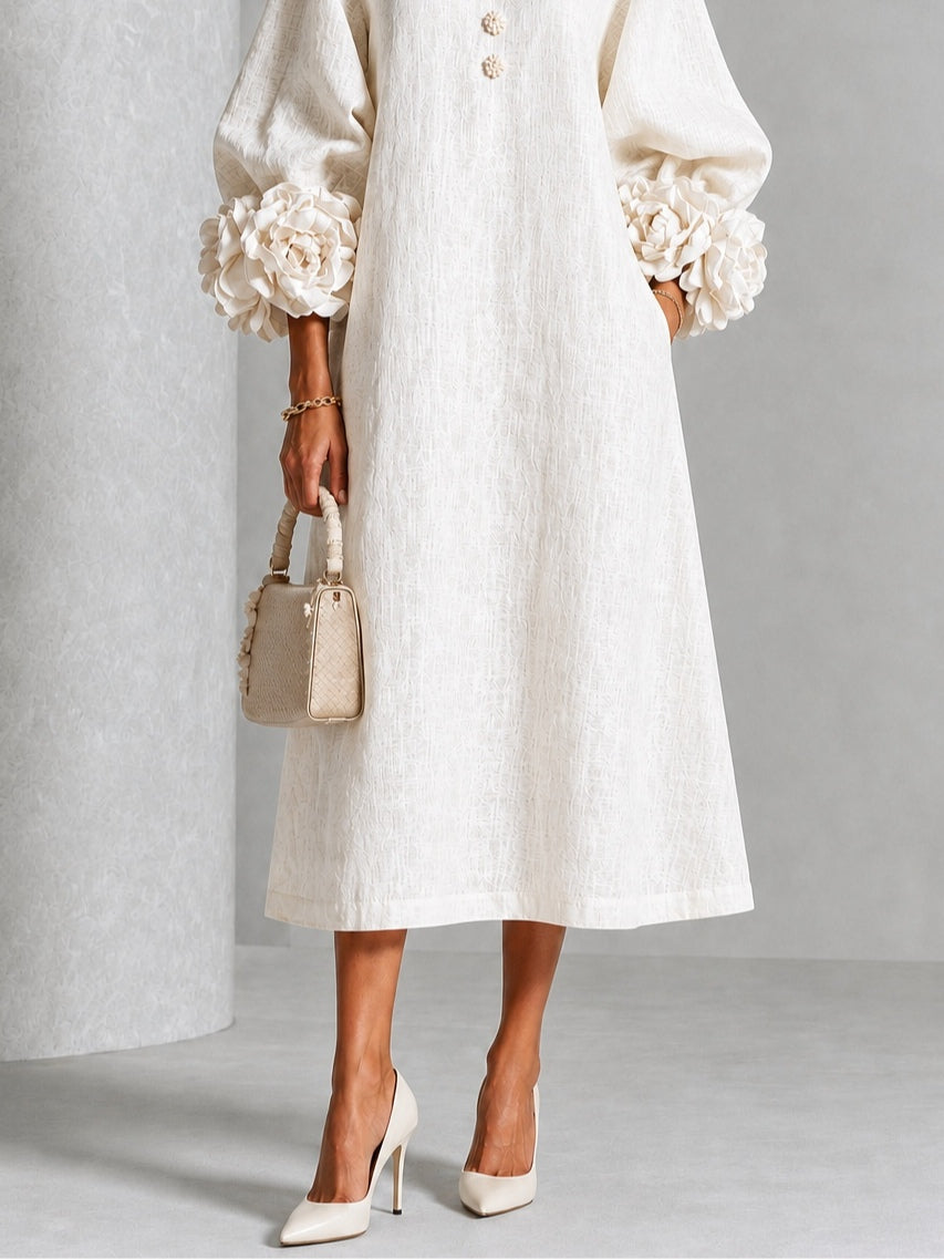 Vestido midi abotonado de flores en blanco con puños de flores