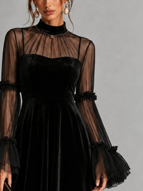 Vestido midi plisado negro de terciopelo y malla transparente