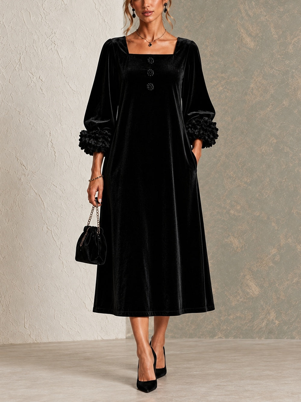 Vestido midi negro de terciopelo con escote cuadrado, botones florales y puños de flores