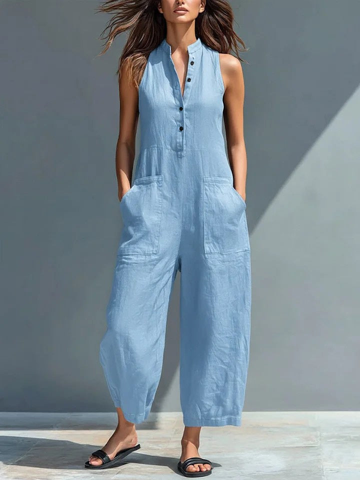 Mono negro minimalista efecto lino con cuello camisero, sin mangas y holgado