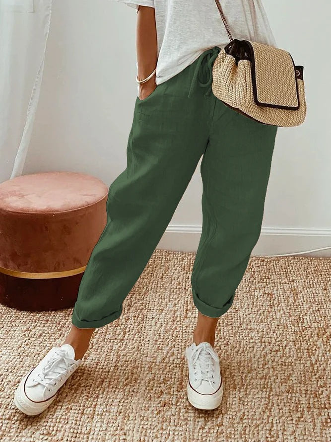 Pantalón casual de color liso con bolsillos laterales y cordón